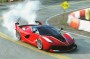 Interesting tidbit: Rustchynsky is using the Ferrari FXX-K car in the video. Is it an underhanded punch at Kunos Simulazioni's Assetto Corsa, which will feature the same car on the box art?